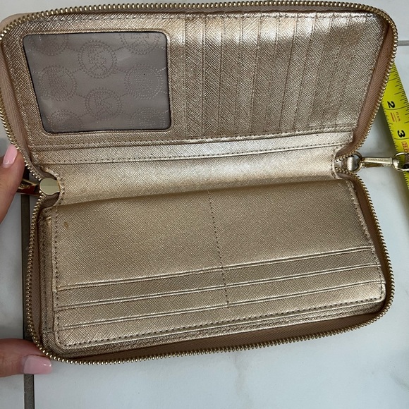 Michael Kors metallic gold zip up wallet or clutch. - Picture 8 of 10